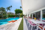 Mid-Century Kidney-Shaped Pool And Covered Furnished Patio